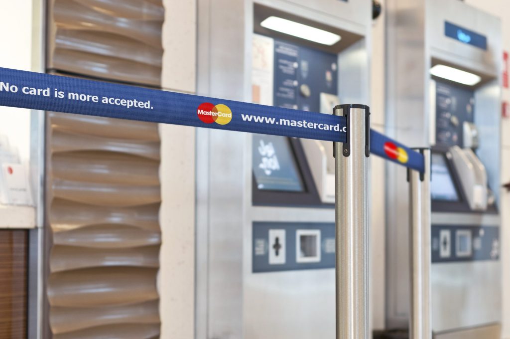 Mastercard bespoke webbing from Tensator, in an aluminum stanchion.